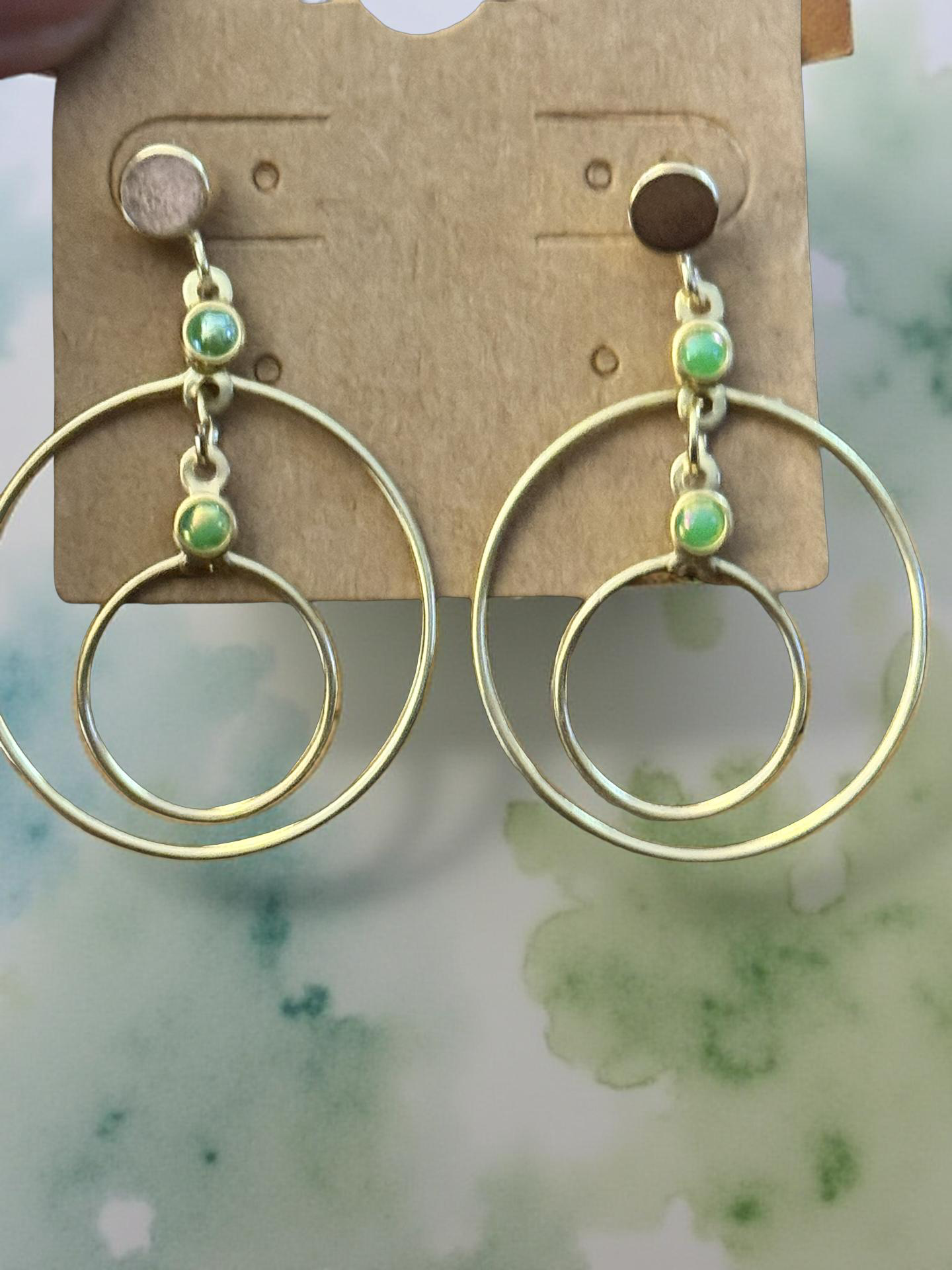 Gold and green dangle earrings