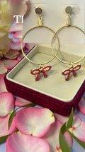 MEDIUM GOLD AND HOT PINK BOW EARRINGS